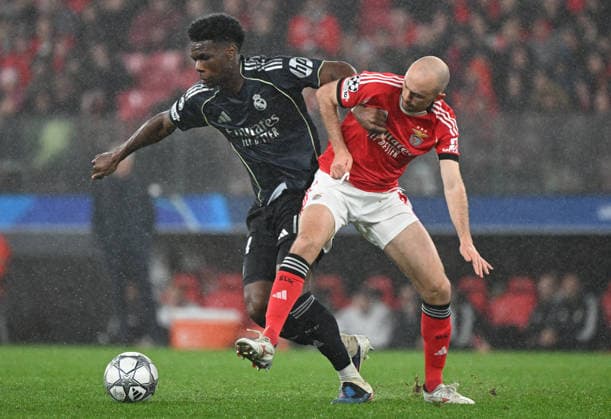 Benfica v Real Madrid - UEFA Champions League LISBON, PORTUGAL - JANUARY 28: Fredrik Aursnes of SL Benfica and Aurelien Tchouameni of Real Madrid challenge for the ball during the UEFA Champions League 2025 26 League Phase MD8 match between SL Benfica and Real Madrid C.F. at Estadio da Luz on January 28, 2026 in Lisbon, Portugal. Zed Jameson Anadolu Lisbon Portugal. Editorial use only. Please get in touch for any other usage.  Copyright: x2026xAnadoluxZedxJamesonx