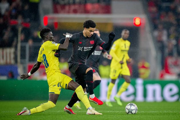 LEVERKUSEN, GERMANY - 1 JANUARY, 2023: Malik Tillman, Pape Gueye - The UEFA Champions League football match between Bayer 04 Leverkusen vs Villareal FC at BayArena.  Copyright: xVitaliixKliuievx