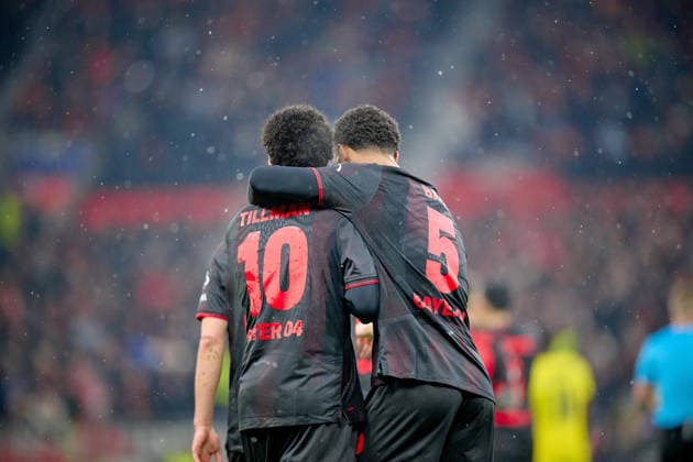 LEVERKUSEN, GERMANY - 1 JANUARY, 2023: Malik Tillman, Loic Bade - The UEFA Champions League football match between Bayer 04 Leverkusen vs Villareal FC at BayArena.  Copyright: xVitaliixKliuievx