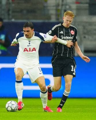Joao Palhinha of Tottenham Hotspur battles with Hugo Larsson of Eintracht Frankfurt Eintracht Frankfurt v Tottenham Hotspur, UEFA Champions League, Group Stage, Football, Deutsche Bank Park, Frankfurt, Germany - 28 Jan 2026Frankfurt Deutsche Bank Park Germany EDITORIAL USE ONLY No use with unauthorised audio, video, data, fixture lists, club league logos or live services. Online in-match use limited to 120 images, no video emulation. No use in betting, games or single club league player publications. Copyright: xJavierxGarcia Shutterstockx 16429470fd