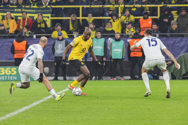 28.01.2026, xgrfx, Fussball UEFA Champions League , Borussia Dortmund - Inter Mailand v.l. Federico Dimarco (Inter Mailand), Serhou Guirassy (Borussia Dortmund), Francesco Acerbi (Inter Mailand) (DFL DFB REGULATIONS PROHIBIT ANY USE OF PHOTOGRAPHS as IMAGE SEQUENCES and or QUASI-VIDEO) Signal Iduna Park