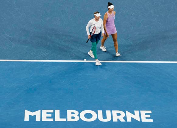 (260129) -- MELBOURNE, Jan. 29, 2026 -- Shibahara Ena (R) Vera Zvonareva react during the women s doubles semifinal match between Zhang Shuai (China) Elise Mertens (Belgium) and Shibahara Ena (Japan) Vera Zvonareva (Russia) at the Australian Open tennis tournament in Melbourne, Australia, Jan. 29, 2026. ) (SP)AUSTRALIA-MELBOURNE-TENNIS-AUSTRALIAN OPEN-WOMEN S DOUBLES-SEMIFINALS MaxPing 