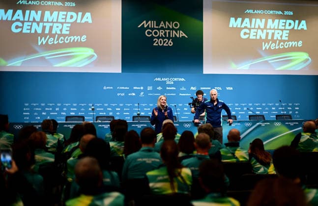 (260129) -- MILAN, Jan. 29, 2026 -- Kirsty Coventry (L), President of International Olympic Committee (IOC), speaks to volunteers during a meeting with Milano Cortina 2026 volunteers in Milan, Italy, Jan. 29, 2026. (Photo by Pool Photo via Reuters) (SP)ITALY-MILAN-MILANO CORTINA 2026 OLYMPICS-MEETING-VOLUNTEERS DanielexMascolo 