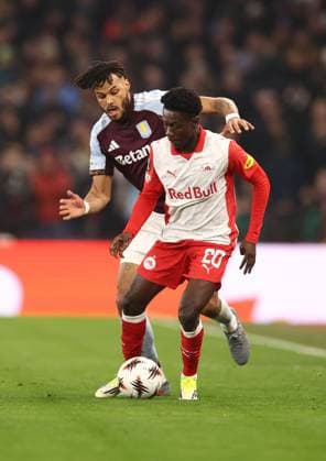 Tyrone Mings of Aston Villa and Edmund Baidoo of Red Bull Salzburg Aston Villa v Red Bull Salzburg, UEFA Europa League, Group Stage, Football, Villa Park, Birmingham, UK - 29 Jan 2026Birmingham Villa Park United Kingdom EDITORIAL USE ONLY No use with unauthorised audio, video, data, fixture lists, club league logos or live services. Online in-match use limited to 120 images, no video emulation. No use in betting, games or single club league player publications. Copyright: xRyanxBrowne Shutterstockx 16445867aw