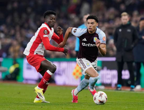 Birmingham, England, 29th January 2026. Edmund Baidoo of Red Bull Salzburg tackles George Hemmings of Aston Villa during the Aston Villa vs FC Salzburg UEFA Europa League match at Villa Park, Birmingham. Picture credit should read: Andrew Yates Sportimage EDITORIAL USE ONLY. No use with unauthorised audio, video, data, fixture lists, club league logos or live services. Online in-match use limited to 120 images, no video emulation. No use in betting, games or single club league player publications. SPI_030_AY_Villa_Salzburg SPI-4490-0030