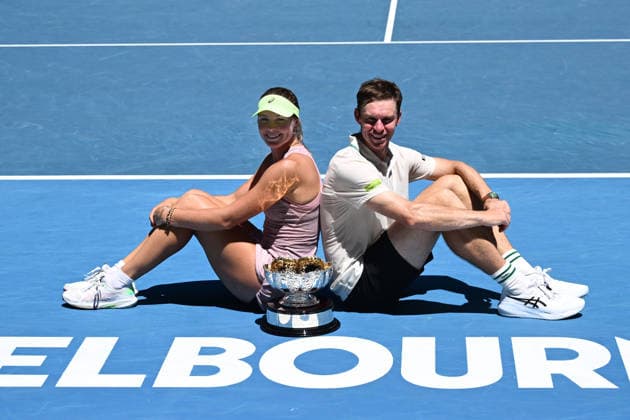 TENNIS AUSTRALIAN OPEN, Olivia Gadecki and John Peers of Australia pose with the trophy following their win over Kristina Mladenovic and Manuel Guinard of France in the mixed doubles final on day 13 of the 2026 Australian Open tennis tournament at Melbourne Park in Melbourne, Friday, January 30, 2026. ( NO ARCHIVING MELBOURNE VICTORIA AUSTRALIA  Copyright: xJOELxCARRETTx 20260130120779666396
