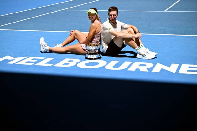 TENNIS AUSTRALIAN OPEN, Olivia Gadecki and John Peers of Australia pose with the trophy following their win over Kristina Mladenovic and Manuel Guinard of France in the mixed doubles final on day 13 of the 2026 Australian Open tennis tournament at Melbourne Park in Melbourne, Friday, January 30, 2026. ( NO ARCHIVING MELBOURNE VICTORIA AUSTRALIA  Copyright: xJOELxCARRETTx 20260130192637370459