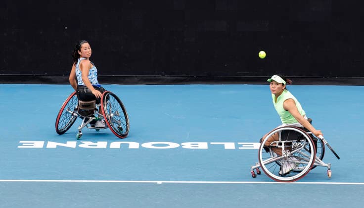 (260130) -- MELBOURNE, Jan. 30, 2026 -- Zhu Zhenzhen (R) Kamiji Yui compete during the women s wheelchair doubles final between Wang Ziying Li Xiaohui (China) and Zhu Zhenzhen (China) Kamiji Yui (Japan) at the Australian Open tennis tournament in Melbourne, Australia, Jan. 30, 2026. ) (SP)AUSTRALIA-MELBOURNE-TENNIS-AUSTRALIAN OPEN-WOMEN S WHEELCHAIR DOUBLES-FINAL MaxPing 