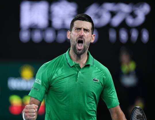 (260130) -- MELBOURNE, Jan. 30, 2026 -- Novak Djokovic reacts during the men s singles semifinal match between Novak Djokovic of Serbia and Jannik Sinner of Italy at the Australian Open tennis tournament in Melbourne, Australia, Jan. 31, 2026. (Photo by Xinhua) (SP)AUSTRALIA-MELBOURNE-TENNIS-AUSTRALIAN OPEN-MEN S SINGLES-SEMIFINAL WangxShen 
