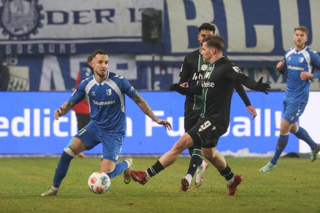 30.01.2026, xgox, Fussball 2. Bundesliga, 1. FC Magdeburg - Hannover 96 emspor, v.l. Falko Michel (Magdeburg, 21), Benjamin Källman (Hannover, 9) (DFL DFB REGULATIONS PROHIBIT ANY USE OF PHOTOGRAPHS as IMAGE SEQUENCES and or QUASI-VIDEO) Magdeburg