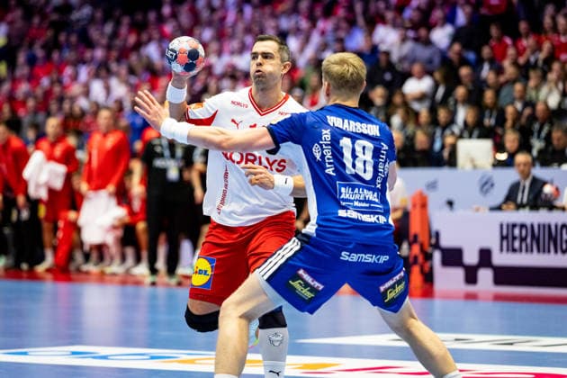 HERNING, DENMARK - JANUARY 30: Rasmus Lauge Schmidt (Denmark, 11) against Ellidi Vidarsson (Iceland, 18) during the EHF EURO 2026 Semifinal 2 match between Denmark vs Iceland at Jyske Bank Boxen Arena on January 30, 2026 in Herning, Denmark. Midtjylland Denmark Copyright: xMarioxM.xKobergx