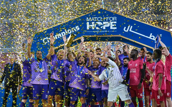 MATCH FOR HOPE QATAR 2026 CHARITY SOCCER MATCH Players of Team Chunkz celebrate with trophy after winning the Match for Hope charity soccer match between Team Chunkz and Team Abu flah at Ahmad Bin Ali Stadium in Al Rayyan, Qatar, on January 30, 2026. DOHA Qatar Copyright: xNOUSHADx