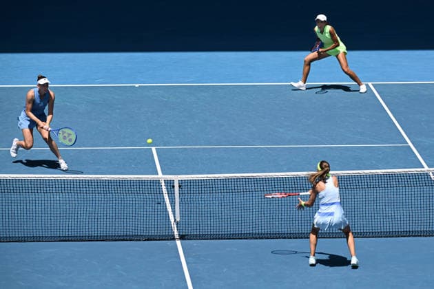 TENNIS AUSTRALIAN OPEN, Elise Mertens of Belgium and Shuai Zhang of China (top) in action during the women™s doubles final against Anna Danilina of Kazakhstan and Aleksandra Krunic of Serbia on day 14 of the 2026 Australian Open tennis tournament at Melbourne Park in Melbourne, Saturday, January 31, 2026. ( NO ARCHIVING MELBOURNE VICTORIA AUSTRALIA  Copyright: xJOELxCARRETTx 20260131141408376644