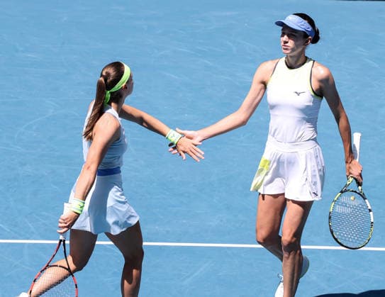 (260131) -- MELBOURNE, Jan. 31, 2026 -- Anna Danilina (R) Aleksandra Krunic celebrate scoring during the women s doubles final match between Zhang Shuai (China) Elise Mertens (Belgium) and Anna Danilina (Kazakhstan) Aleksandra Krunic (Serbia) at the Australian Open tennis tournament in Melbourne, Australia, Jan. 31, 2026. ) (SP)AUSTRALIA-MELBOURNE-TENNIS-AUSTRALIAN OPEN-WOMEN S DOUBLES-FINAL MaxPing 