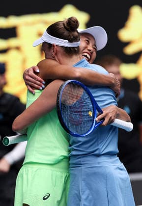 (260131) -- MELBOURNE, Jan. 31, 2026 -- Zhang Shuai (L) hugs Elise Mertens after winning the women s doubles final match between Zhang Shuai (China) Elise Mertens (Belgium) and Anna Danilina (Kazakhstan) Aleksandra Krunic (Serbia) at the Australian Open tennis tournament in Melbourne, Australia, Jan. 31, 2026. ) (SP)AUSTRALIA-MELBOURNE-TENNIS-AUSTRALIAN OPEN-WOMEN S DOUBLES-FINAL MaxPing 
