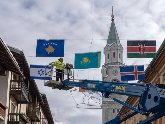 January 30, 2026, Cortina D ampezzo, Belluno, Italy: International flags are hung all ng the walking street with only a few days until the start of the 2026 Milano Cortina Winter Olympics. A buzz of frantic last minute construction, preparations and excitement is noticeable in the venues and village of Cortina dÃ¢â‚¬â ¢Ampezzo Thursday, January 30, 2026. Cortina D ampezzo Italy - ZUMAa35_ 20260130_oly_a35_004 Copyright: xDanxAndersonx