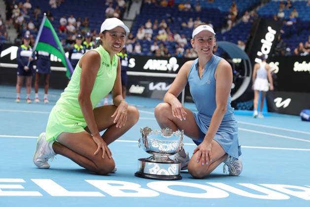 Zhang Shuai (yellow), CHN, and Elise Mertens (blue), BEL, after womens doubles finals at 2026 Australian Open in Melbourne, 31 01 2026; -