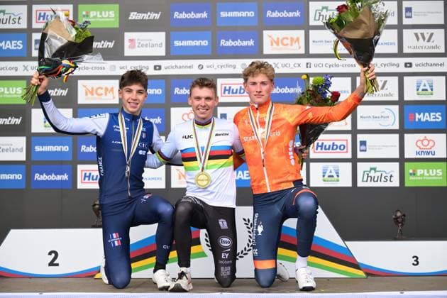 French Aubin Sparfel, Belgian Aaron Dockx and Dutch Keije Solen celebrate on the podium after the U23 men race at the UCI Cyclocross World Championships, on Saturday 31 January 2026, in Hulst, The Netherlands. DAVIDxPINTENS  x160035573x