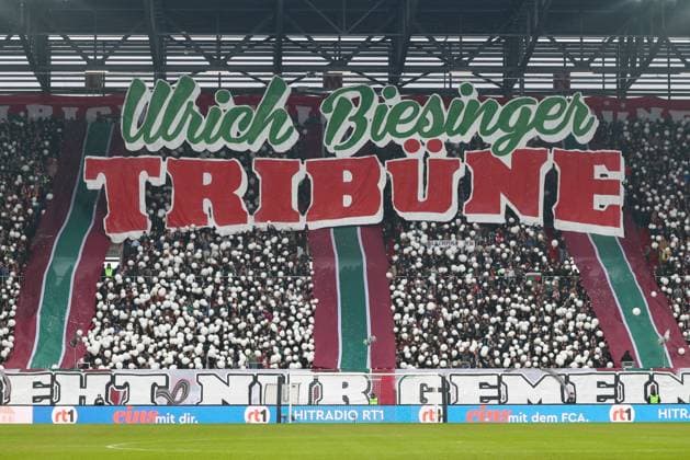 Fans (FC Augsburg) mit Choreo Ulrich Biesinger Tribuene, FC Augsburg vs. FC St. Pauli, Fussball, 1. Bundesliga, 20. Spieltag, 31.01.2026 DFB regulations prohibit any use of photographs as image sequences and or quasi-video Augsburg Bayern Deutschland *** Fans FC Augsburg with Choreo Ulrich Biesinger Tribuene, FC Augsburg vs FC St Pauli, Soccer, 1 Bundesliga, 20 Matchday, 31 01 2026 DFB regulations prohibit any use of photographs as image sequences and or quasi video Augsburg Bayern Germany Copyright: xkolbert-press ChristianxKolbertx