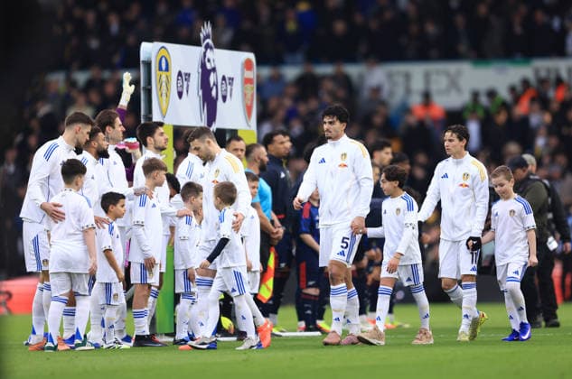 Leeds, England, 31st January 2026. The Leeds United team walk out during the Leeds United vs Arsenal Premier League match at Elland Road, Leeds. Picture credit should read: Jessica Hornby Sportimage EDITORIAL USE ONLY. No use with unauthorised audio, video, data, fixture lists, club league logos or live services. Online in-match use limited to 120 images, no video emulation. No use in betting, games or single club league player publications. SPI_036_JH_LEEDS_ARSENAL SPI-4494-0036