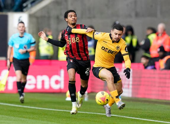 Wolverhampton, England, 31st January 2026. Amine Adli of Bournemouth tussles with Andre of Wolverhampton Wanderers during the Wolverhampton Wanderers vs AFC Bournemouth Premier League match at Molineux, Wolverhampton. Picture credit should read: Andrew Yates Sportimage EDITORIAL USE ONLY. No use with unauthorised audio, video, data, fixture lists, club league logos or live services. Online in-match use limited to 120 images, no video emulation. No use in betting, games or single club league player publications. SPI_020_AY_Wolves_Bmouth SPI-4493-0021