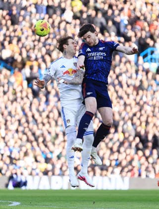 Leeds, England, 31st January 2026. Joe Rodon of Leeds United and Declan Rice of Arsenal during the Leeds United vs Arsenal Premier League match at Elland Road, Leeds. Picture credit should read: Jessica Hornby Sportimage EDITORIAL USE ONLY. No use with unauthorised audio, video, data, fixture lists, club league logos or live services. Online in-match use limited to 120 images, no video emulation. No use in betting, games or single club league player publications. SPI_037_JH_LEEDS_ARSENAL SPI-4494-0037