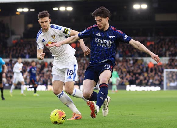 Leeds, England, 31st January 2026. Anton Stach of Leeds United (l) and Declan Rice of Arsenal (r) during the Leeds United vs Arsenal Premier League match at Elland Road, Leeds. Picture credit should read: Jessica Hornby Sportimage EDITORIAL USE ONLY. No use with unauthorised audio, video, data, fixture lists, club league logos or live services. Online in-match use limited to 120 images, no video emulation. No use in betting, games or single club league player publications. SPI_040_JH_LEEDS_ARSENAL SPI-4494-0044