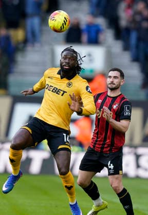 Wolverhampton, England, 31st January 2026. Tolu Arokodare of Wolverhampton Wanderers and Lewis Cook of Bournemouth during the Wolverhampton Wanderers vs AFC Bournemouth Premier League match at Molineux, Wolverhampton. Picture credit should read: Andrew Yates Sportimage EDITORIAL USE ONLY. No use with unauthorised audio, video, data, fixture lists, club league logos or live services. Online in-match use limited to 120 images, no video emulation. No use in betting, games or single club league player publications. SPI_023_AY_Wolves_Bmouth SPI-4493-0023