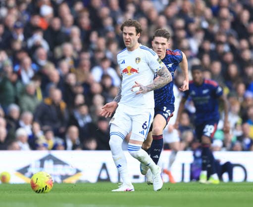 Leeds, England, 31st January 2026. Joe Rodon of Leeds United plays back under pressure from Viktor Gyokeres of Arsenal during the Leeds United vs Arsenal Premier League match at Elland Road, Leeds. Picture credit should read: Jessica Hornby Sportimage EDITORIAL USE ONLY. No use with unauthorised audio, video, data, fixture lists, club league logos or live services. Online in-match use limited to 120 images, no video emulation. No use in betting, games or single club league player publications. SPI_050_JH_LEEDS_ARSENAL SPI-4494-0050