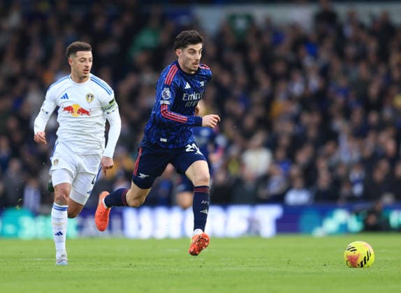 Leeds, England, 31st January 2026. Kai Havertz of Arsenal moves a head of Ethan Ampadu of Leeds United during the Leeds United vs Arsenal Premier League match at Elland Road, Leeds. Picture credit should read: Jessica Hornby Sportimage EDITORIAL USE ONLY. No use with unauthorised audio, video, data, fixture lists, club league logos or live services. Online in-match use limited to 120 images, no video emulation. No use in betting, games or single club league player publications. SPI_056_JH_LEEDS_ARSENAL SPI-4494-0052