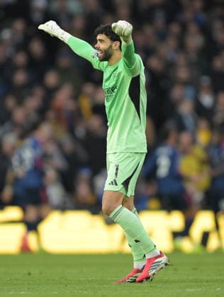 Goalkeeper David Raya of Arsenal celebrates the second goal scored by Goalkeeper Karl Darlow of Leeds United 0-2 Leeds United v Arsenal, Premier League, Football, Elland Road, Leeds, UK - 31 Jan 2026Leeds Elland Road United Kingdom EDITORIAL USE ONLY No use with unauthorised audio, video, data, fixture lists, club league logos or live services. Online in-match use limited to 120 images, no video emulation. No use in betting, games or single club league player publications. Copyright: xGreigxCowie Shutterstockx 16496741am