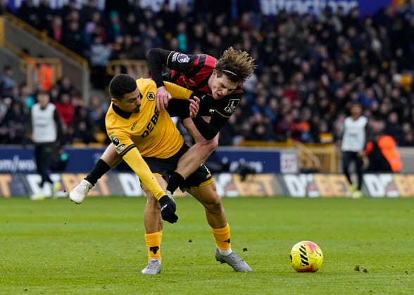 Leeds, England, 31st January 2026. Andre of Wolverhampton Wanderers tackles Alex Scott of Bournemouth during the Leeds United vs Arsenal Premier League match at Elland Road, Leeds. Picture credit should read: Jessica Hornby Sportimage EDITORIAL USE ONLY. No use with unauthorised audio, video, data, fixture lists, club league logos or live services. Online in-match use limited to 120 images, no video emulation. No use in betting, games or single club league player publications. SPI_040_AY_Wolves_Bmouth SPI-4494-0057
