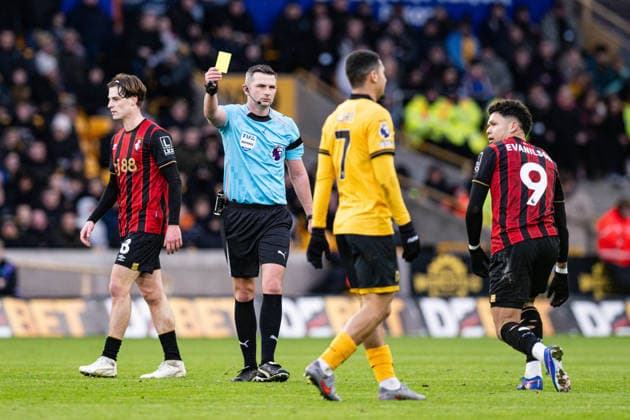 31st January 2026; Molineux Stadium, Wolverhampton, West Midlands, England; Premier League Football, Wolverhampton Wanderers versus Bournemouth; Referee Michael Oliver issues a yellow card to Andre of Wolverhampton Wanderers  GodfreyxPitt Content restricted for UK based newspaper