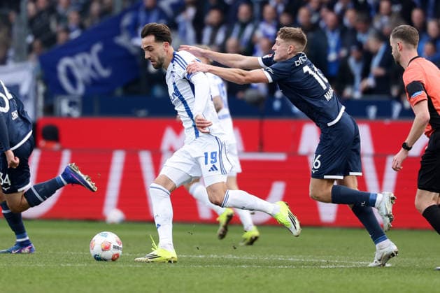Bochum, Germany, 31.01.26, Kenan Karaman (FC Schalke 04) und Callum Marshall (VfL Bochum) während des Spiels der 2. Bundesliga zwischen VfL 1848 Bochum - FC Schalke 04 im Vonovia Ruhrstadion in Bochum. (Photo by Joachim Bywaletz) DFB DFL REGULATIONS PROHIBIT ANY USE OF PHOTOGRAPHS AS IMAGE SEQUENCES AND OR QUASI-VIDEO.