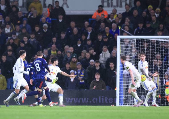 Leeds, England, 31st January 2026. Gabriel Jesus of Arsenal (hidden) scores their fourth goal during the Leeds United vs Arsenal Premier League match at Elland Road, Leeds. Picture credit should read: Jessica Hornby Sportimage EDITORIAL USE ONLY. No use with unauthorised audio, video, data, fixture lists, club league logos or live services. Online in-match use limited to 120 images, no video emulation. No use in betting, games or single club league player publications. SPI_076_JH_LEEDS_ARSENAL SPI-4494-0079