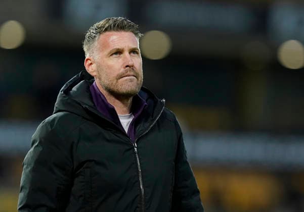 Wolverhampton, England, 31st January 2026. Dejected Rob Edwards manager of Wolverhampton Wanderers claps the fans during the Wolverhampton Wanderers vs AFC Bournemouth Premier League match at Molineux, Wolverhampton. Picture credit should read: Andrew Yates Sportimage EDITORIAL USE ONLY. No use with unauthorised audio, video, data, fixture lists, club league logos or live services. Online in-match use limited to 120 images, no video emulation. No use in betting, games or single club league player publications. SPI_059_AY_Wolves_Bmouth SPI-4493-0057