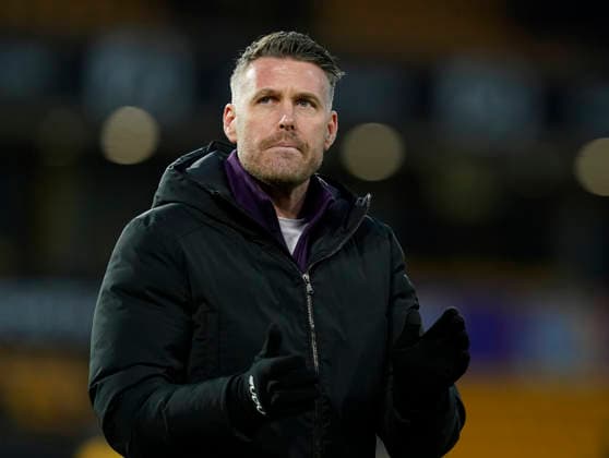Wolverhampton, England, 31st January 2026. Dejected Rob Edwards manager of Wolverhampton Wanderers claps the fans during the Wolverhampton Wanderers vs AFC Bournemouth Premier League match at Molineux, Wolverhampton. Picture credit should read: Andrew Yates Sportimage EDITORIAL USE ONLY. No use with unauthorised audio, video, data, fixture lists, club league logos or live services. Online in-match use limited to 120 images, no video emulation. No use in betting, games or single club league player publications. SPI_060_AY_Wolves_Bmouth SPI-4493-0058