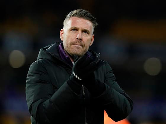 Wolverhampton, England, 31st January 2026. Dejected Rob Edwards manager of Wolverhampton Wanderers claps the fans during the Wolverhampton Wanderers vs AFC Bournemouth Premier League match at Molineux, Wolverhampton. Picture credit should read: Andrew Yates Sportimage EDITORIAL USE ONLY. No use with unauthorised audio, video, data, fixture lists, club league logos or live services. Online in-match use limited to 120 images, no video emulation. No use in betting, games or single club league player publications. SPI_061_AY_Wolves_Bmouth SPI-4493-0059