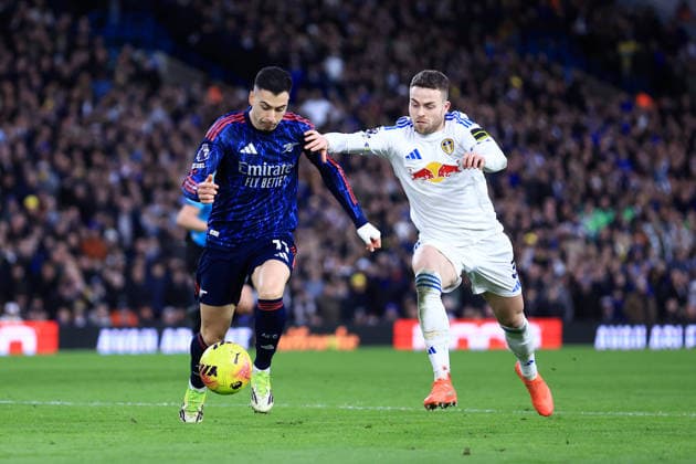Leeds, England, 31st January 2026. Gabriel Martinelli of Arsenal is challenged by Gabriel Gudmundsson of Leeds United during the Leeds United vs Arsenal Premier League match at Elland Road, Leeds. Picture credit should read: Jessica Hornby Sportimage EDITORIAL USE ONLY. No use with unauthorised audio, video, data, fixture lists, club league logos or live services. Online in-match use limited to 120 images, no video emulation. No use in betting, games or single club league player publications. SPI_098_JH_LEEDS_ARSENAL SPI-4494-0101