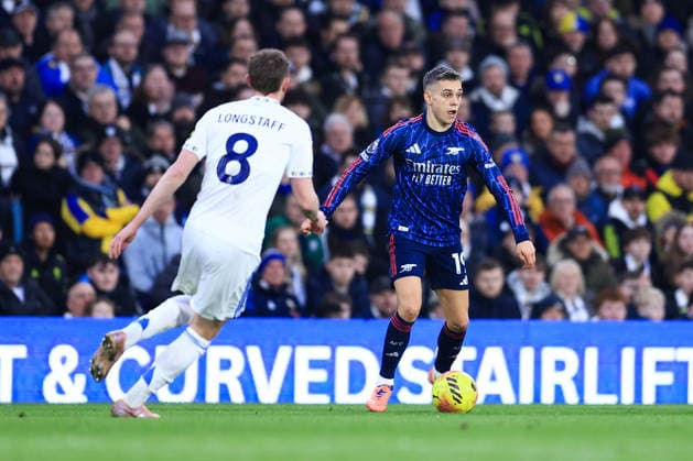 Leeds, England, 31st January 2026. Leandro Trossard of Arsenal is challenged by Sean Longstaff of Leeds United during the Leeds United vs Arsenal Premier League match at Elland Road, Leeds. Picture credit should read: Jessica Hornby Sportimage EDITORIAL USE ONLY. No use with unauthorised audio, video, data, fixture lists, club league logos or live services. Online in-match use limited to 120 images, no video emulation. No use in betting, games or single club league player publications. SPI_102_JH_LEEDS_ARSENAL SPI-4494-0105