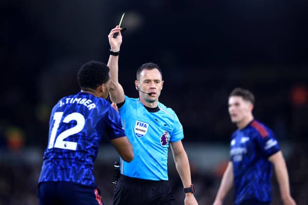 Leeds, England, 31st January 2026. Referee Stuart Attwell shows a yellow card to Jurrien Timber of Arsenal after a foul on Gabriel Gudmundsson of Leeds United (not pictured) during the Leeds United vs Arsenal Premier League match at Elland Road, Leeds. Picture credit should read: Jessica Hornby Sportimage EDITORIAL USE ONLY. No use with unauthorised audio, video, data, fixture lists, club league logos or live services. Online in-match use limited to 120 images, no video emulation. No use in betting, games or single club league player publications. SPI_103_JH_LEEDS_ARSENAL SPI-4494-0106