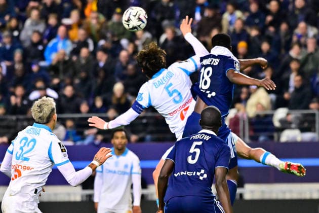 FOOTBALL : Paris FC vs Marseille - Ligue 1 - 31 01 2026 Leonardo BALERDI ( 5 - Olympique Marseille ) and Marshall Munetsi ( 18 - PFC ) during the Ligue 1 match between Paris FC and Olympique de Marseille at Stade Jean Bouin on January 31, 2026 in Paris, France. ( Photo by Federico Pestellini PsnewZ ) - ParisFrance  Copyright: xFedericoxPestellinix