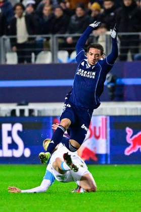 FOOTBALL : Paris FC vs Marseille - Ligue 1 - 31 01 2026 Luca Koleosho ( 24 - PFC ) and Arthur Vermeeren ( 18 - Olympique Marseille ) during the Ligue 1 match between Paris FC and Olympique de Marseille at Stade Jean Bouin on January 31, 2026 in Paris, France. ( Photo by Federico Pestellini PsnewZ ) - ParisFrance  Copyright: xFedericoxPestellinix