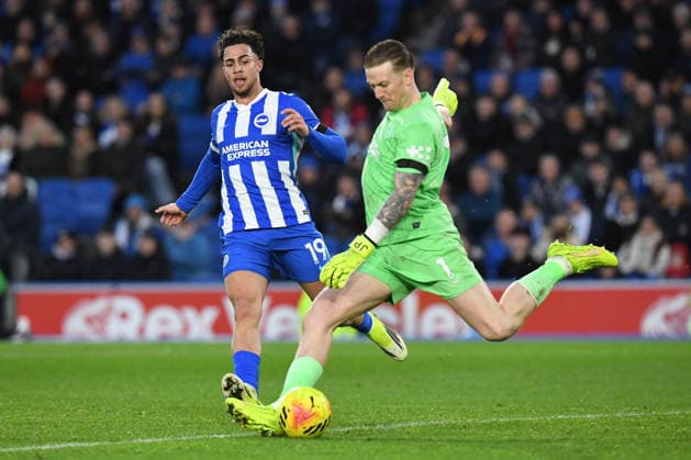Brighton and Hove Albion v Everton, Premier League Jordan Pickford Goalkeeper of Everton FC clears the ball under pressure from Charalampos Kostoulas Forward of Brighton and Hove Albion during the Premier League match between Brighton and Hove Albion and Everton at the American Express Stadium, Brighton and Hove, UK on 31 January 2026. Brighton and Hove American Express Stadium East Sussex UK Editorial use only DataCo restrictions apply See www.football-dataco.com , Copyright: xJeffxMoodx PSI-23658-0090