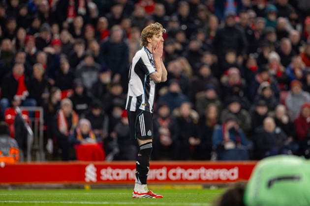 Football - FA Premier League - Liverpool FC v Newcastle United FC LIVERPOOL, ENGLAND - Saturday, January 31, 2026: Newcastle United s Anthony Gordon reacts receiving a yellow card for a foul on Liverpool s goalkeeper Alisson Becker during the FA Premier League match between Liverpool FC and Newcastle United FC at Anfield. (Photo by David Rawcliffe Propaganda) LIVERPOOL Anfield MERSEYSIDE ENGLAND  Copyright: xDavidxRawcliffex P2026-01-31-Liverpool_Newcastle-29