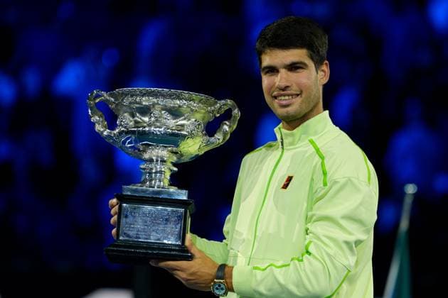 February 1, 2026: 1st seed CARLOS ALCARAZ of Spain with the The Norman Brookes Challenge Cup after defeating 4th seed NOVAK DJOKOVIC of Serbia on Rod Laver Arena in the Men s Singles Final match on day 15 of the 2026 Australian Open in Melbourne, Australia. Cal Media Melbourne Australia - ZUMAc04_ 20260201_faf_c04_027 Copyright: xSydneyxLowx