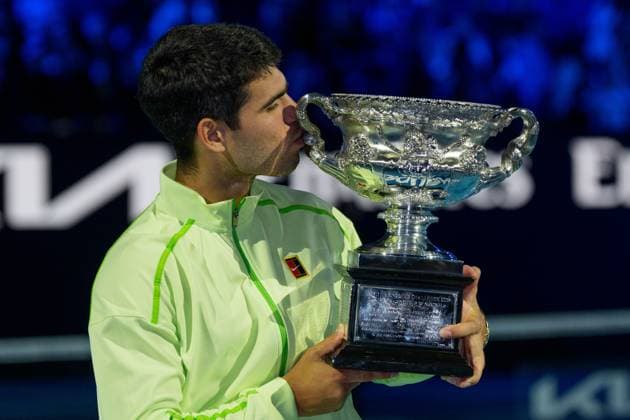 February 1, 2026: 1st seed CARLOS ALCARAZ of Spain with the The Norman Brookes Challenge Cup after defeating 4th seed NOVAK DJOKOVIC of Serbia on Rod Laver Arena in the Men s Singles Final match on day 15 of the 2026 Australian Open in Melbourne, Australia. Cal Media Melbourne Australia - ZUMAc04_ 20260201_faf_c04_029 Copyright: xSydneyxLowx