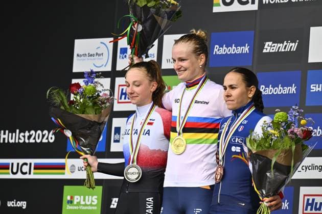 L-R, silver medalist Slovak Viktoria Chladonova, winner Dutch Leonie Bentveld wearing the world champion jersey and bronze medalist French Celia Gery celebrate on the podium of the U23 women race at UCI Cyclocross World Championships, on Sunday 01 February 2026, in Hulst, The Netherlands. ERICxLALMAND  x160237782x