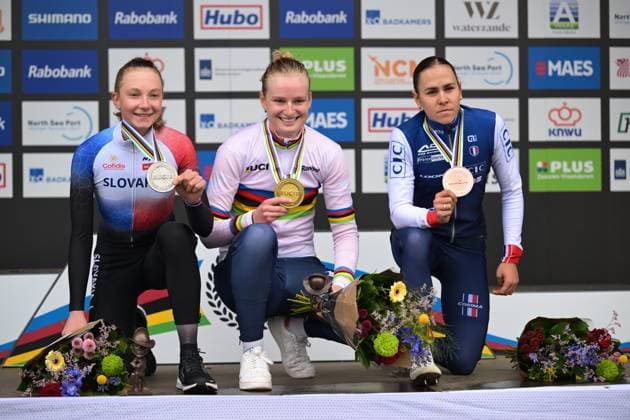 L-R, silver medalist Slovak Viktoria Chladonova, winner Dutch Leonie Bentveld wearing the world champion jersey and bronze medalist French Celia Gery celebrate on the podium of the U23 women race at UCI Cyclocross World Championships, on Sunday 01 February 2026, in Hulst, The Netherlands. DAVIDxPINTENS  x160238913x