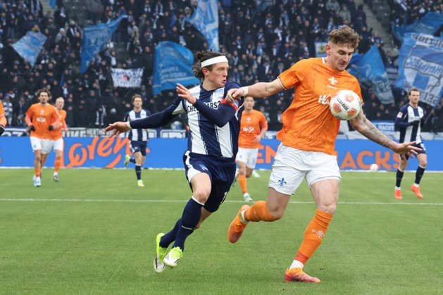 DEU, DFL, 2. FBL, Hertha BSC vs. Darmstadt, 01.02.2026, Berliner Olympiastadion, Berlin, DEU, DFL, 2. FBL, Hertha BSC vs. Darmstadt, im Bild Fabian Reese (Hertha BSC Berlin 11), Matej Maglica (Darmstadt 5) DFL - regulations prohibit any use of Photographs as image sequences and or quasi-video